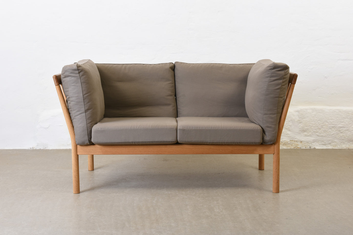 Newly reupholstered: 1980s oak two seater by Finn Østergaard