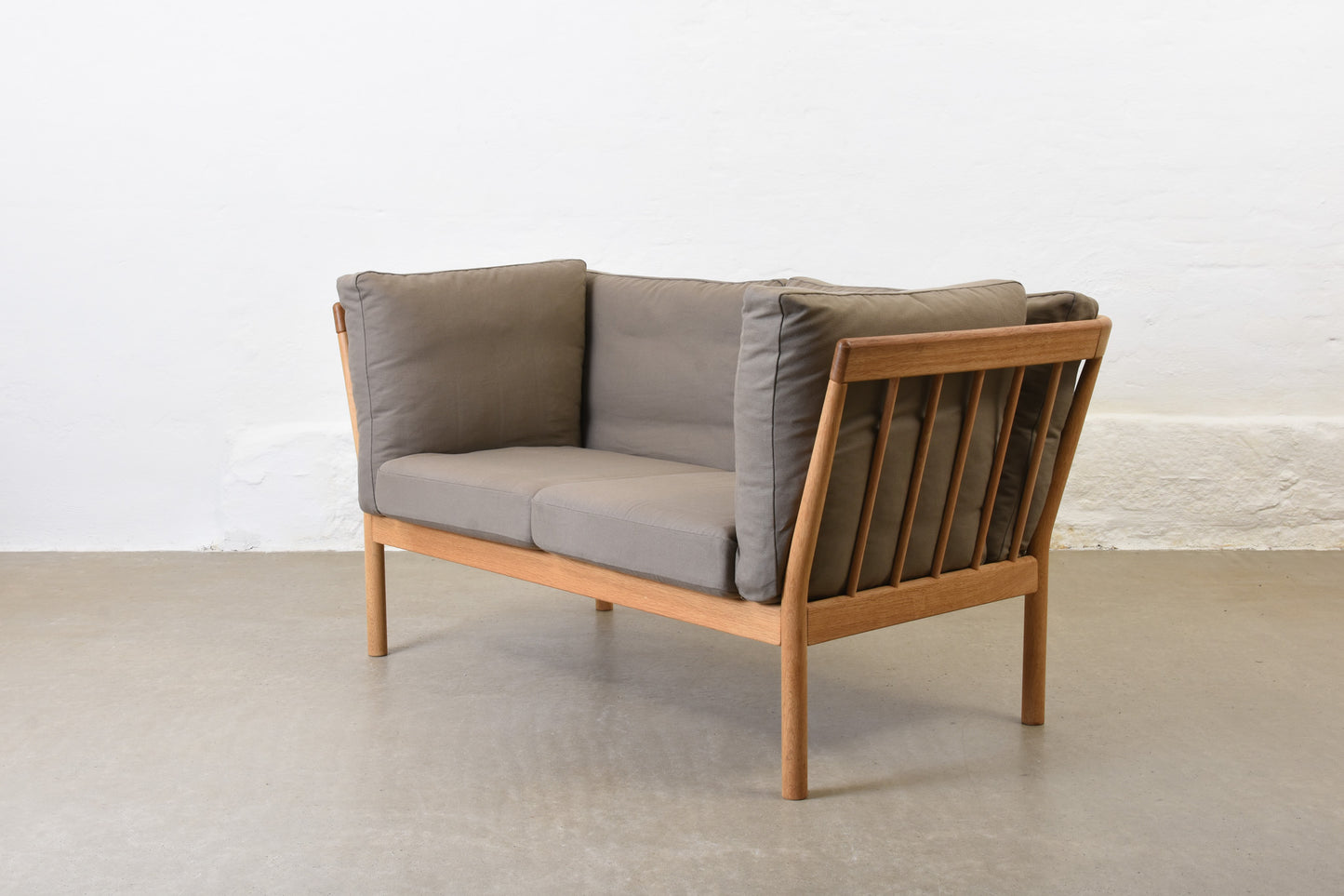 Newly reupholstered: 1980s oak two seater by Finn Østergaard