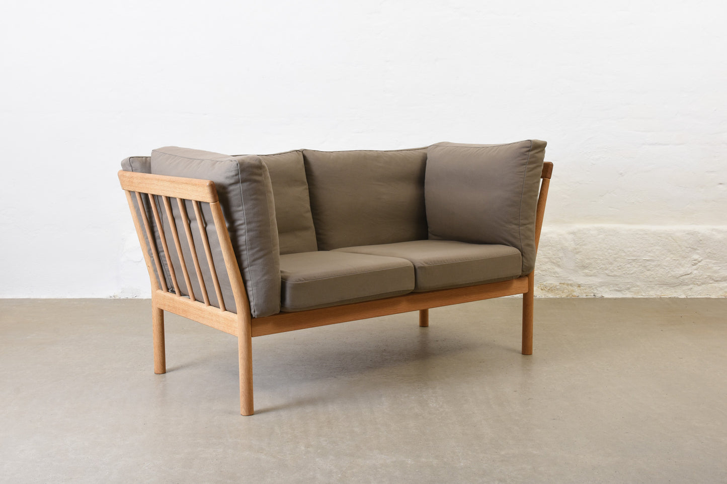 Newly reupholstered: 1980s oak two seater by Finn Østergaard