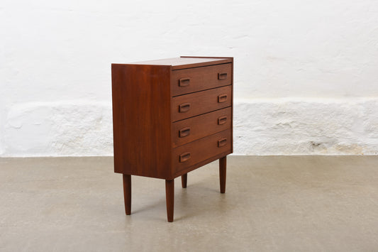 Low teak chest with inset handles