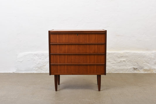 Low teak chest with lipped handles