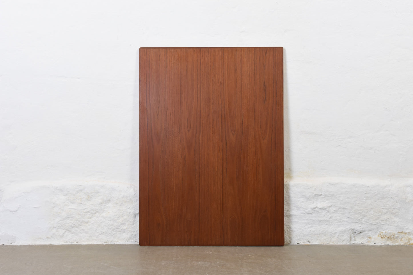 1950s extending teak dining table on beech base