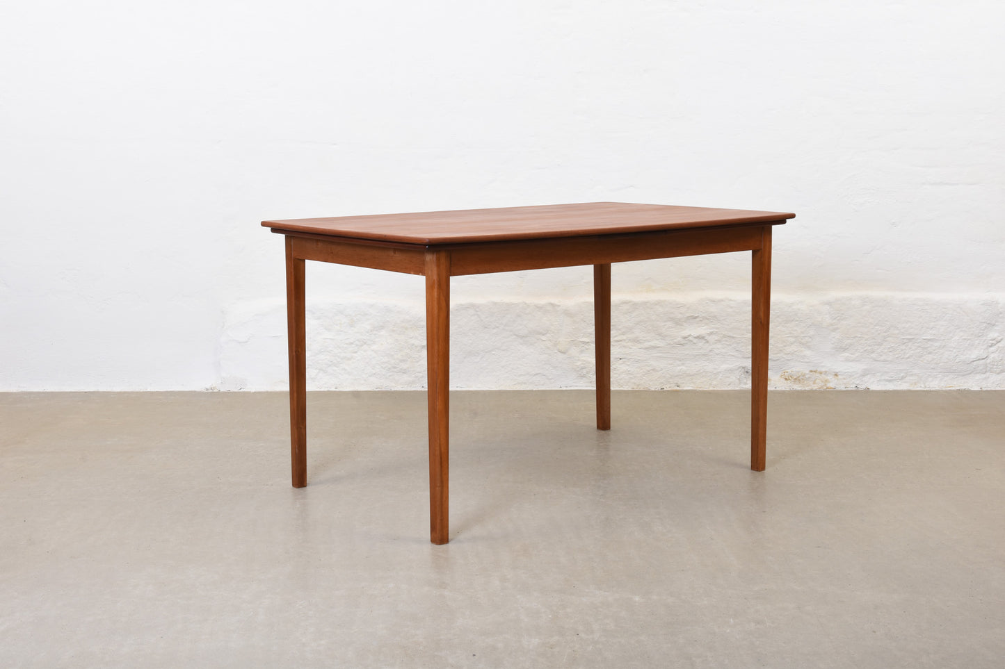 1960s boat-shaped dining table in teak