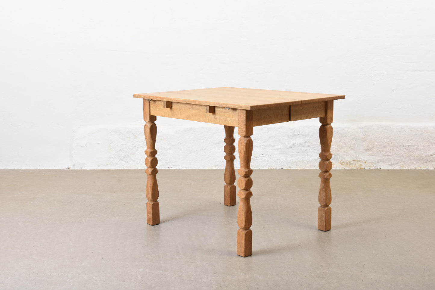 1960s drop leaf dining table in oak by Henning Kjærnulf