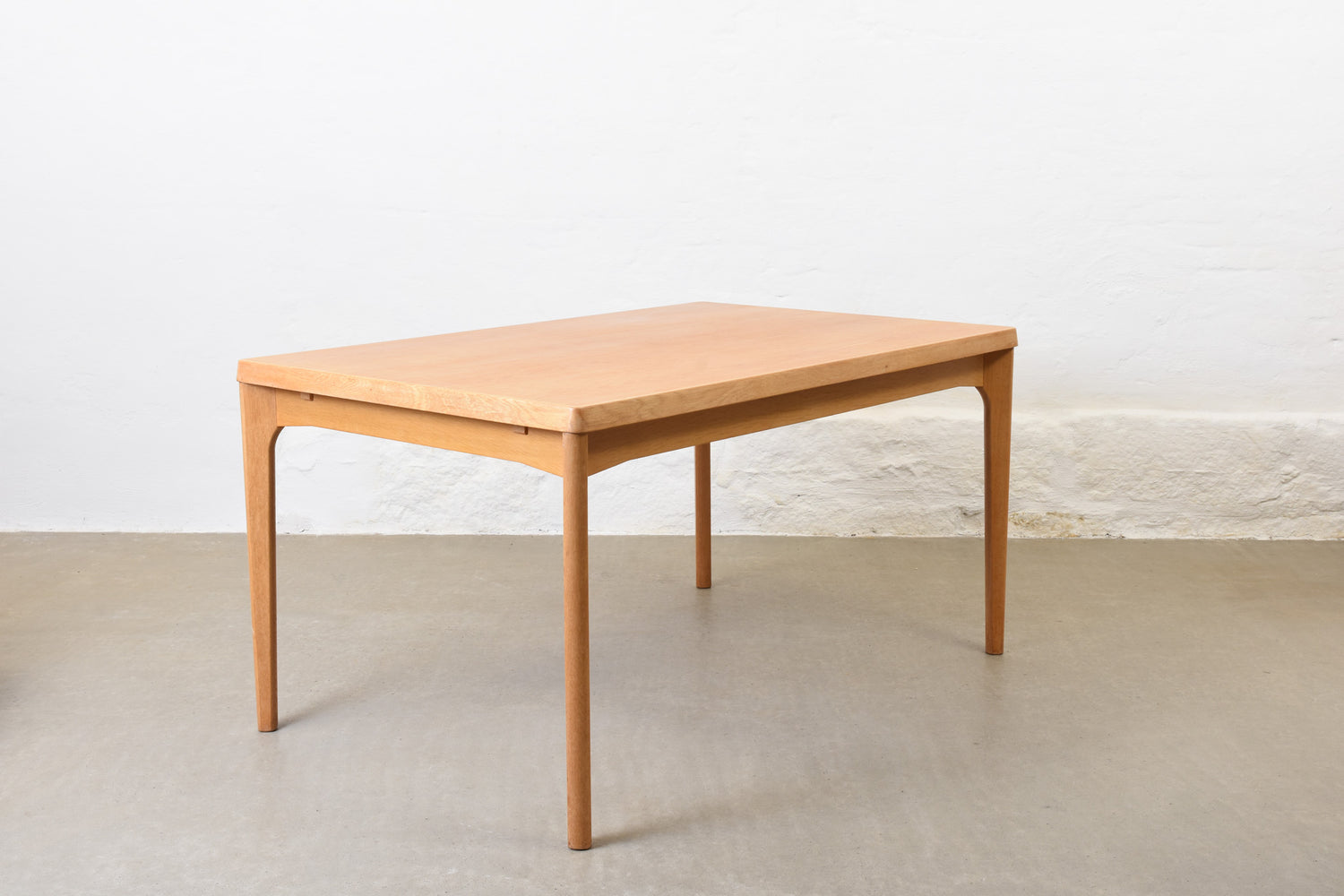 1960s extending oak dining table by Henning Kjærnulf