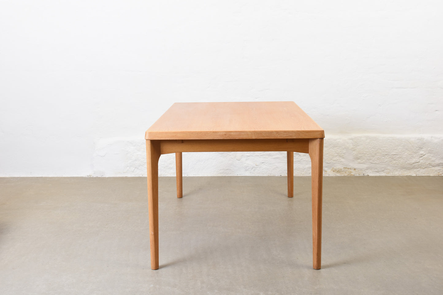 1960s extending oak dining table by Henning Kjærnulf