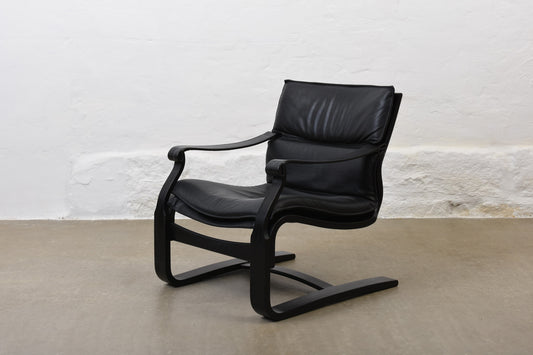 Two available: 1980s leather + beech loungers by Åke Fribytter