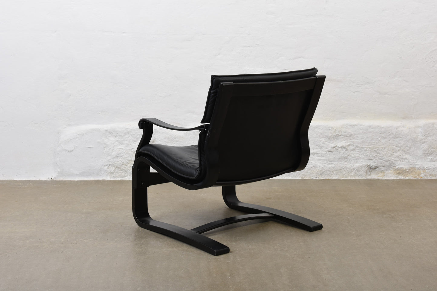 Two available: 1980s leather + beech loungers by Åke Fribytter