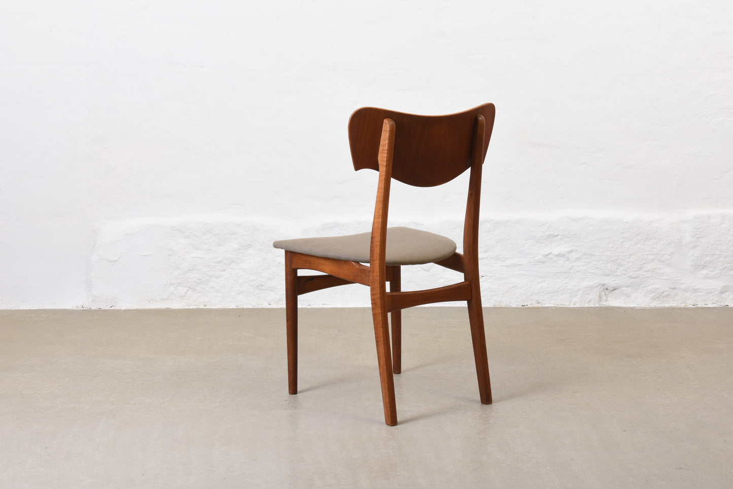 Newly reupholstered: Set of four 1950s teak + oak chairs