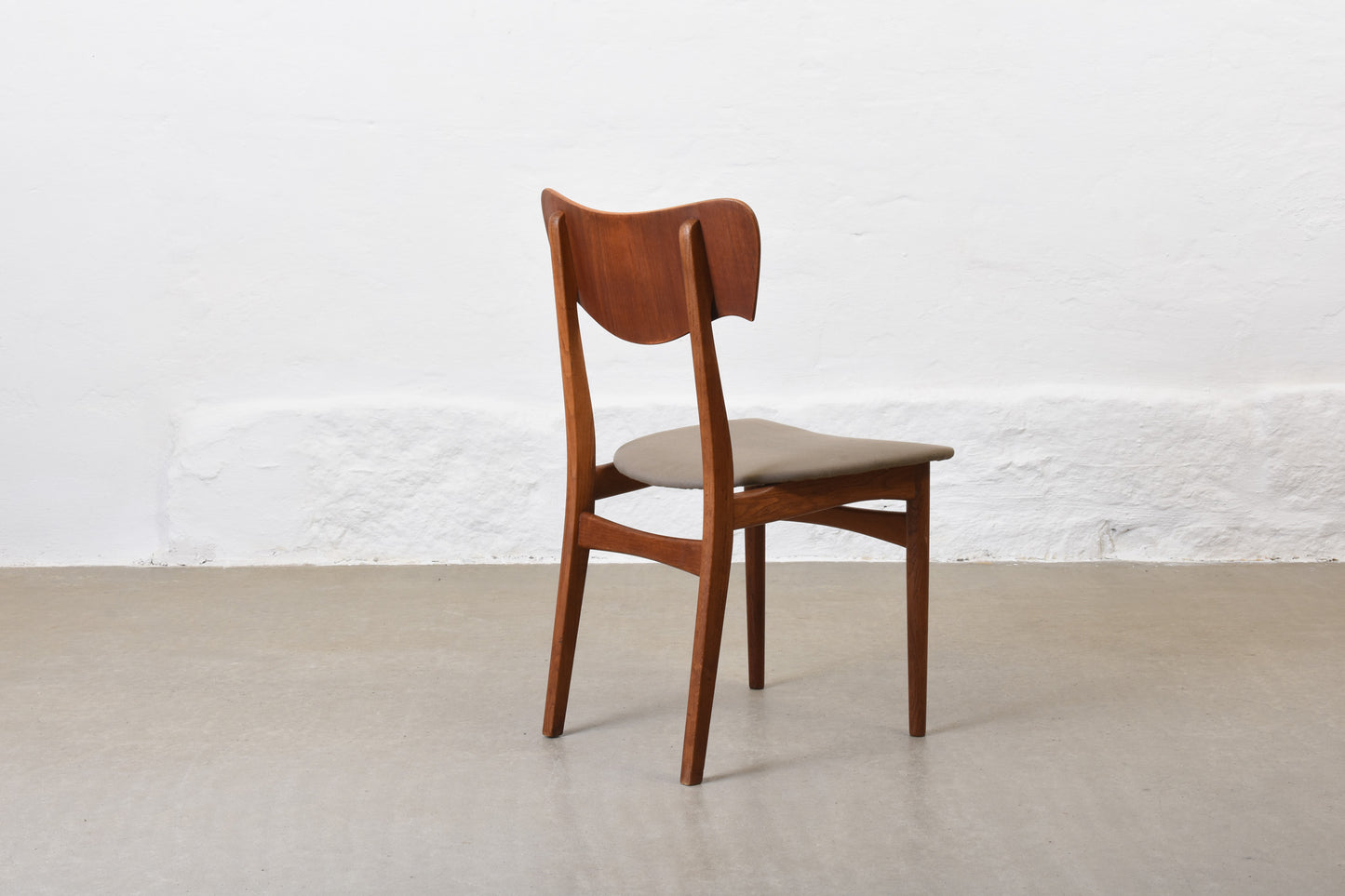 Newly reupholstered: Set of four 1950s teak + oak chairs