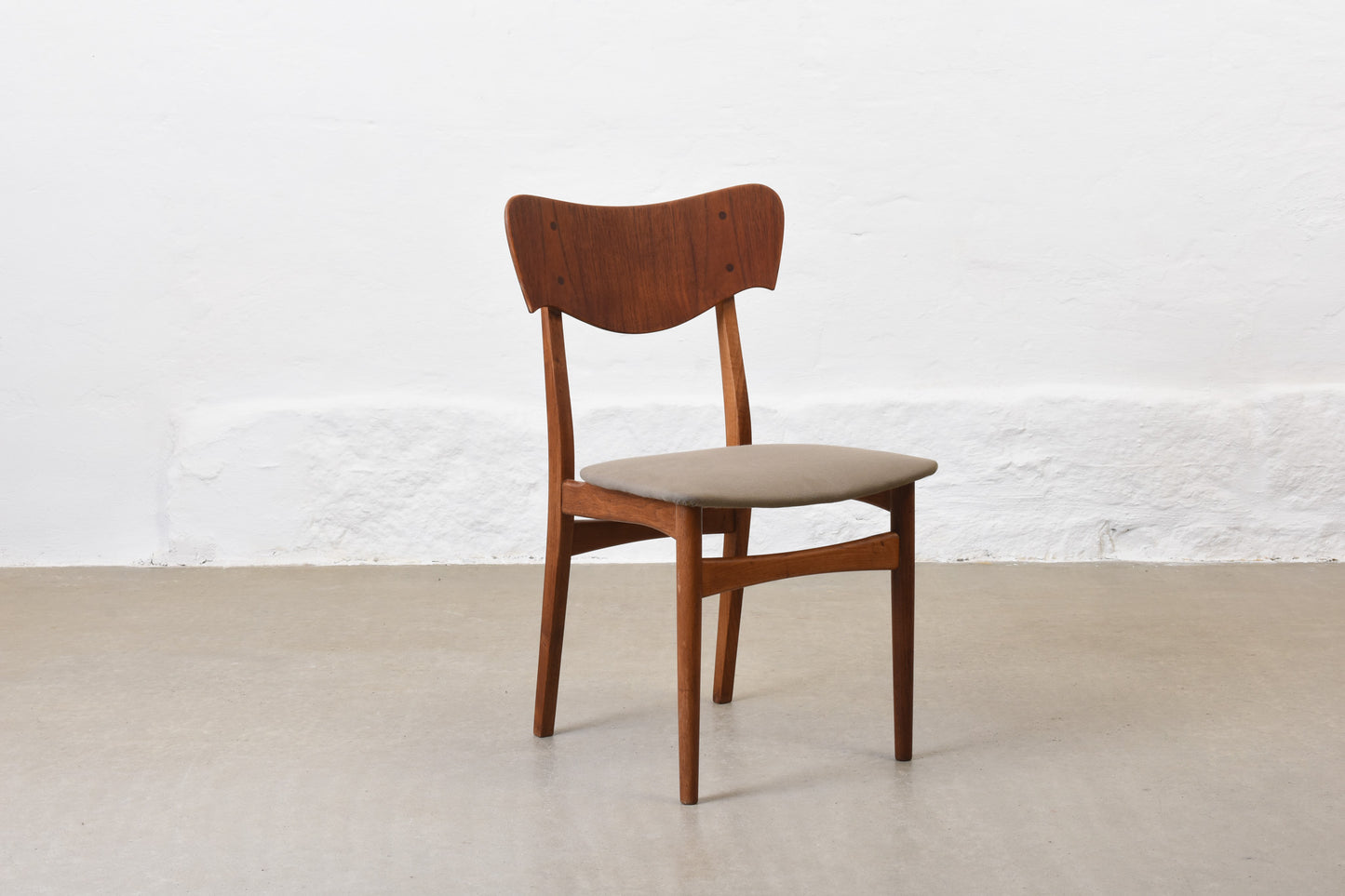 Newly reupholstered: Set of four 1950s teak + oak chairs