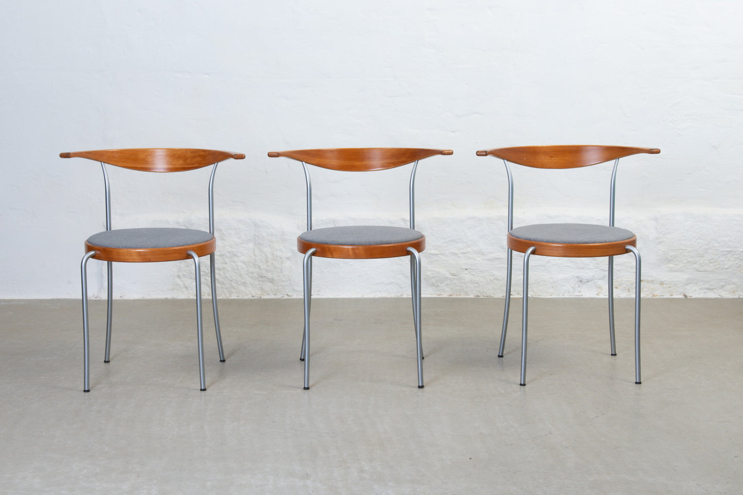 Three available: 1980s stacking armchairs by Rud Thygesen + Johnny Sørensen