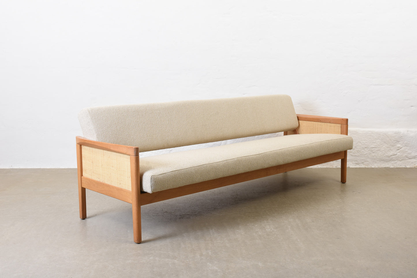 Newly reupholstered: 1960s oak sofa bed by Yngve Ekström