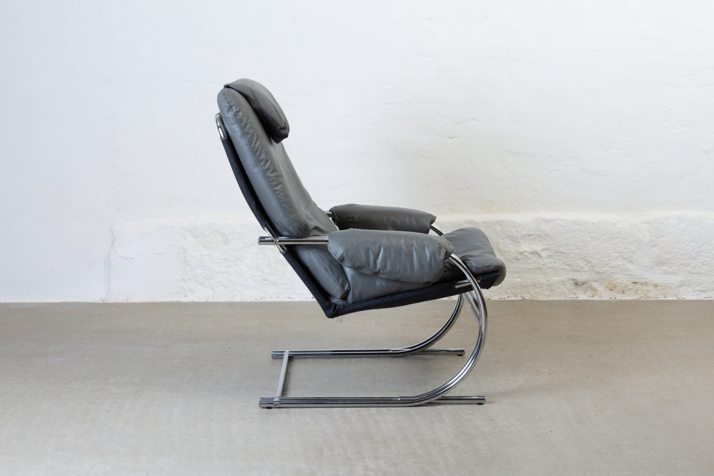 1970s leather + metal lounger
