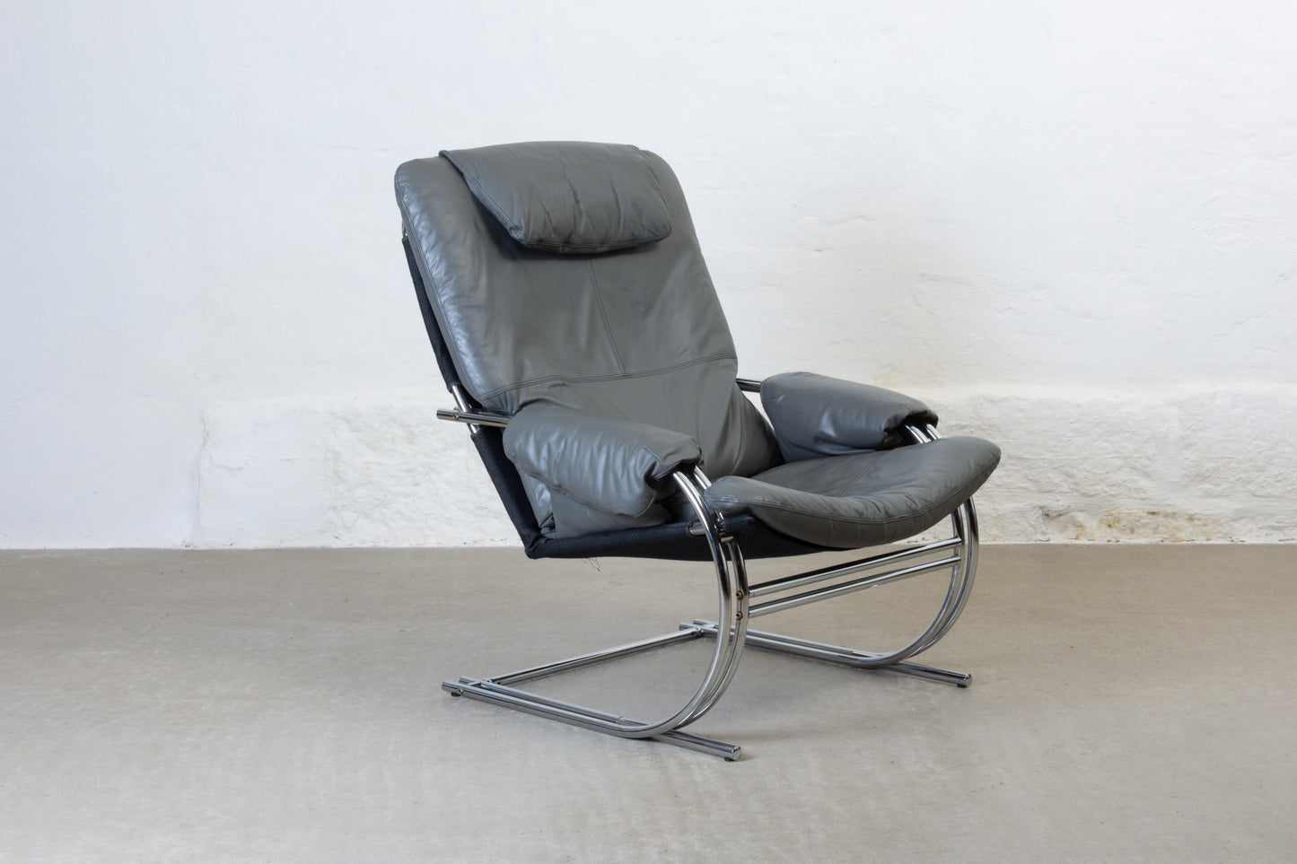 1970s leather + metal lounger