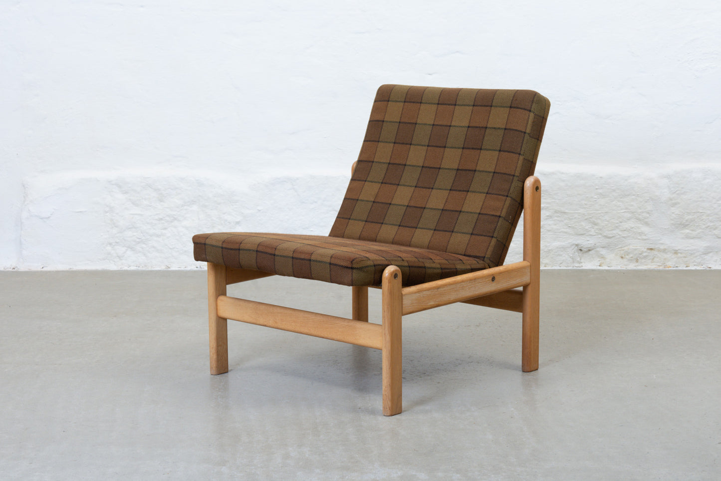 Two available: 1970s oak + wool loungers by Jørgen Bækmark