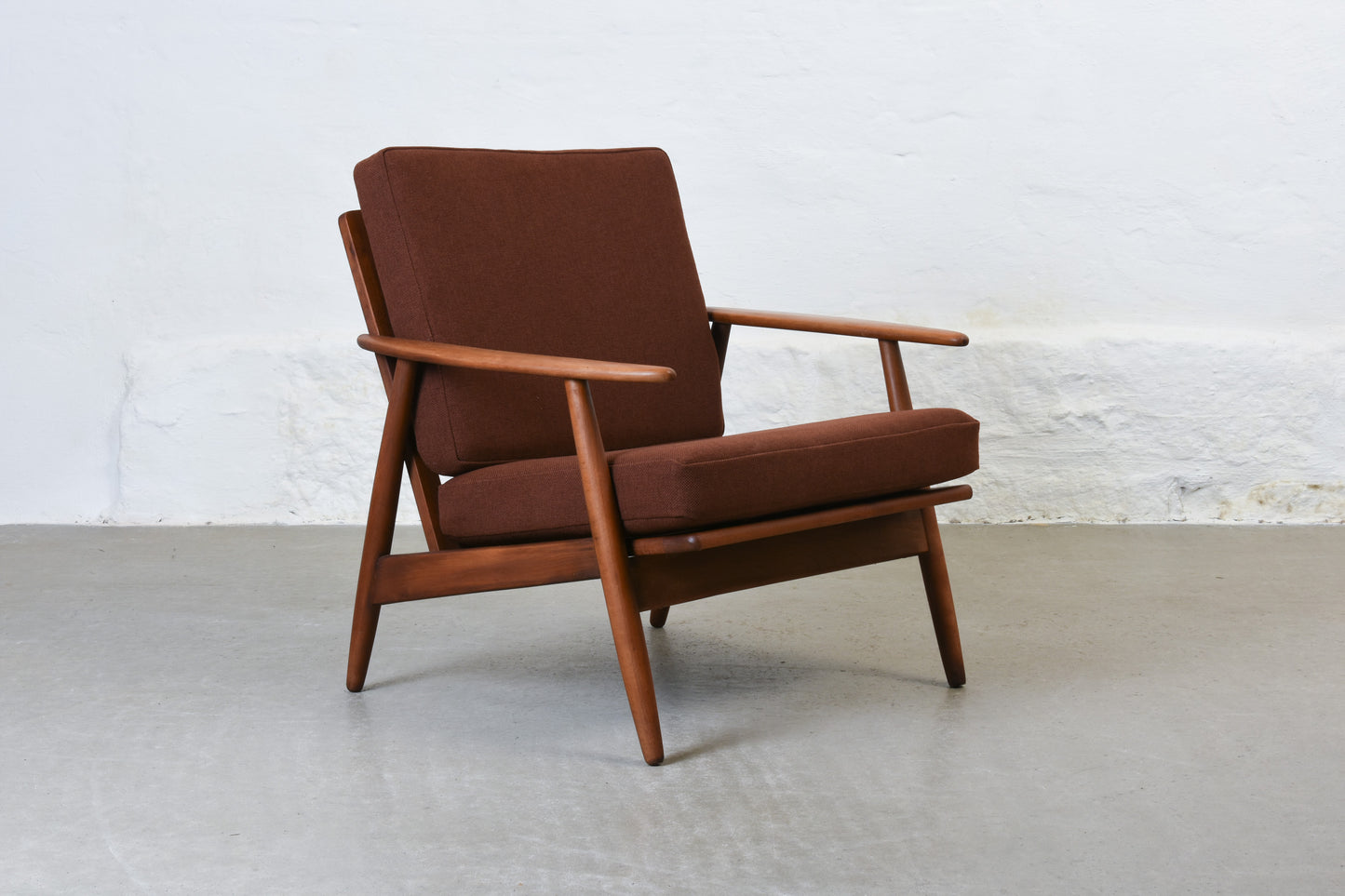 Newly reupholstered: 1960s stained beech lounger