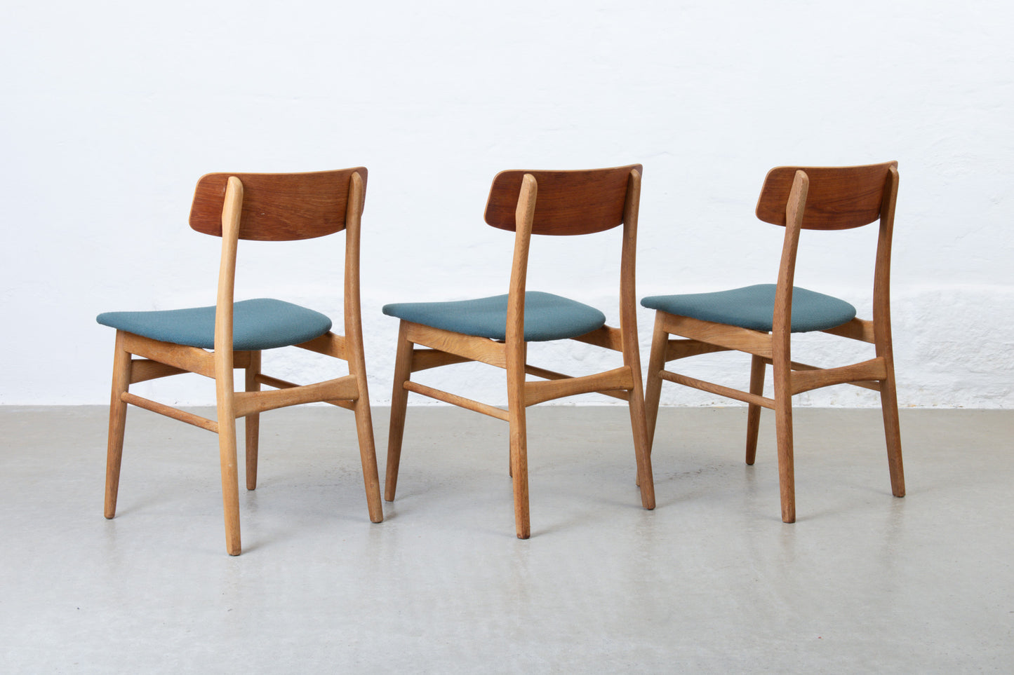 Newly reupholstered: Set of 1960s teak + oak dining chairs