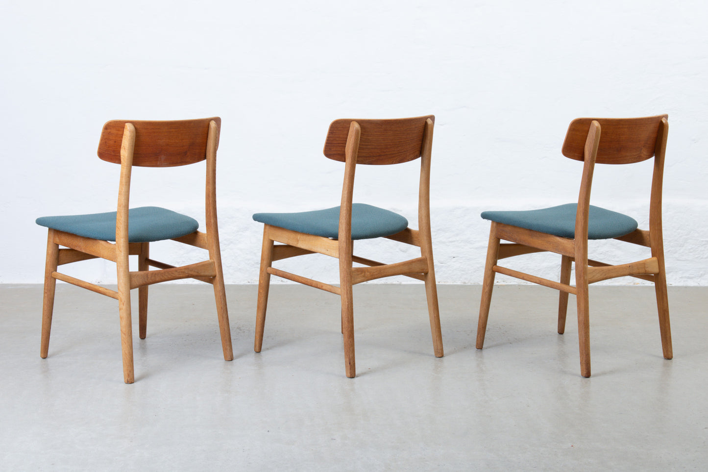 Newly reupholstered: Set of 1960s teak + oak dining chairs