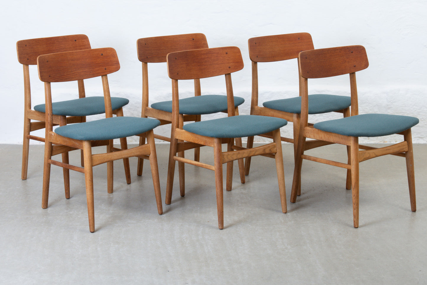 Newly reupholstered: Set of 1960s teak + oak dining chairs
