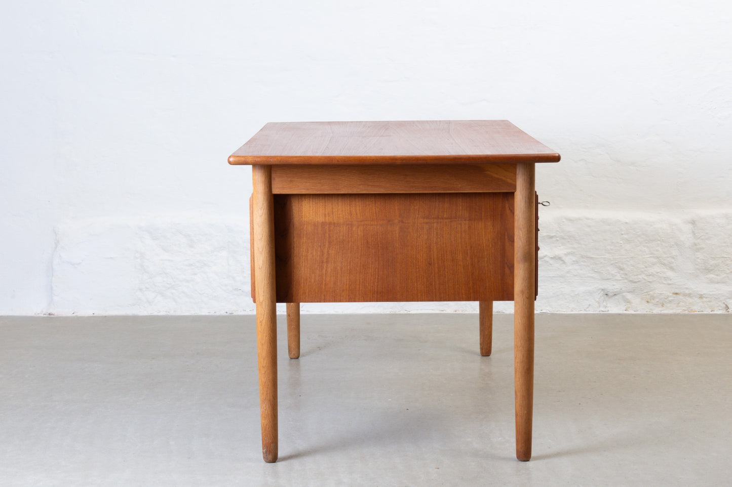1960s twin pedestal desk in teak + oak