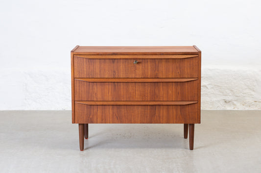 1960s low teak chest of three drawers