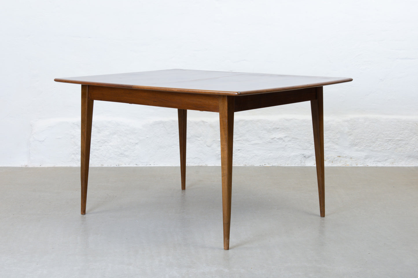1950s extending dining table in walnut