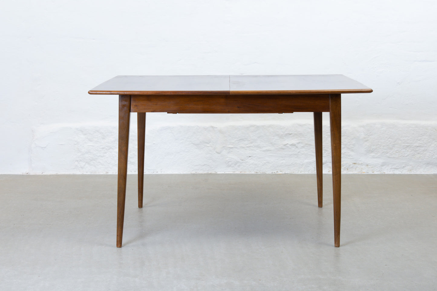1950s extending dining table in walnut