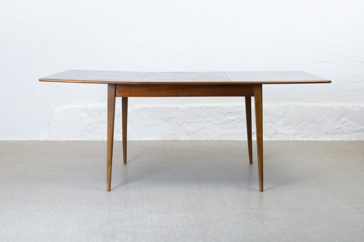 1950s extending dining table in walnut