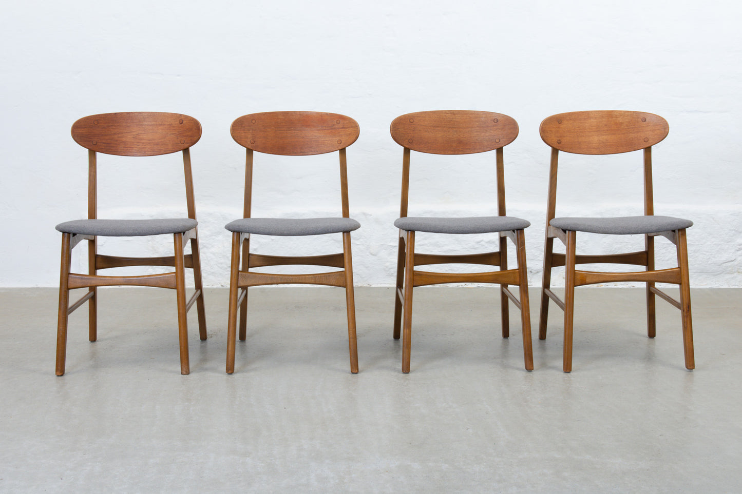 Newly reupholstered: Set of four 1960s teak + beech dining chairs