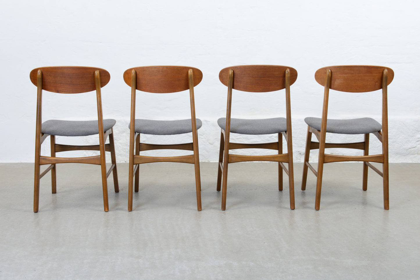 Newly reupholstered: Set of four 1960s teak + beech dining chairs