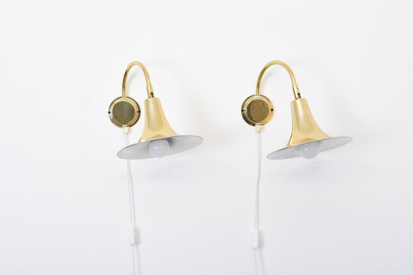 Save £45: 1970s brass wall light by Börje Claes