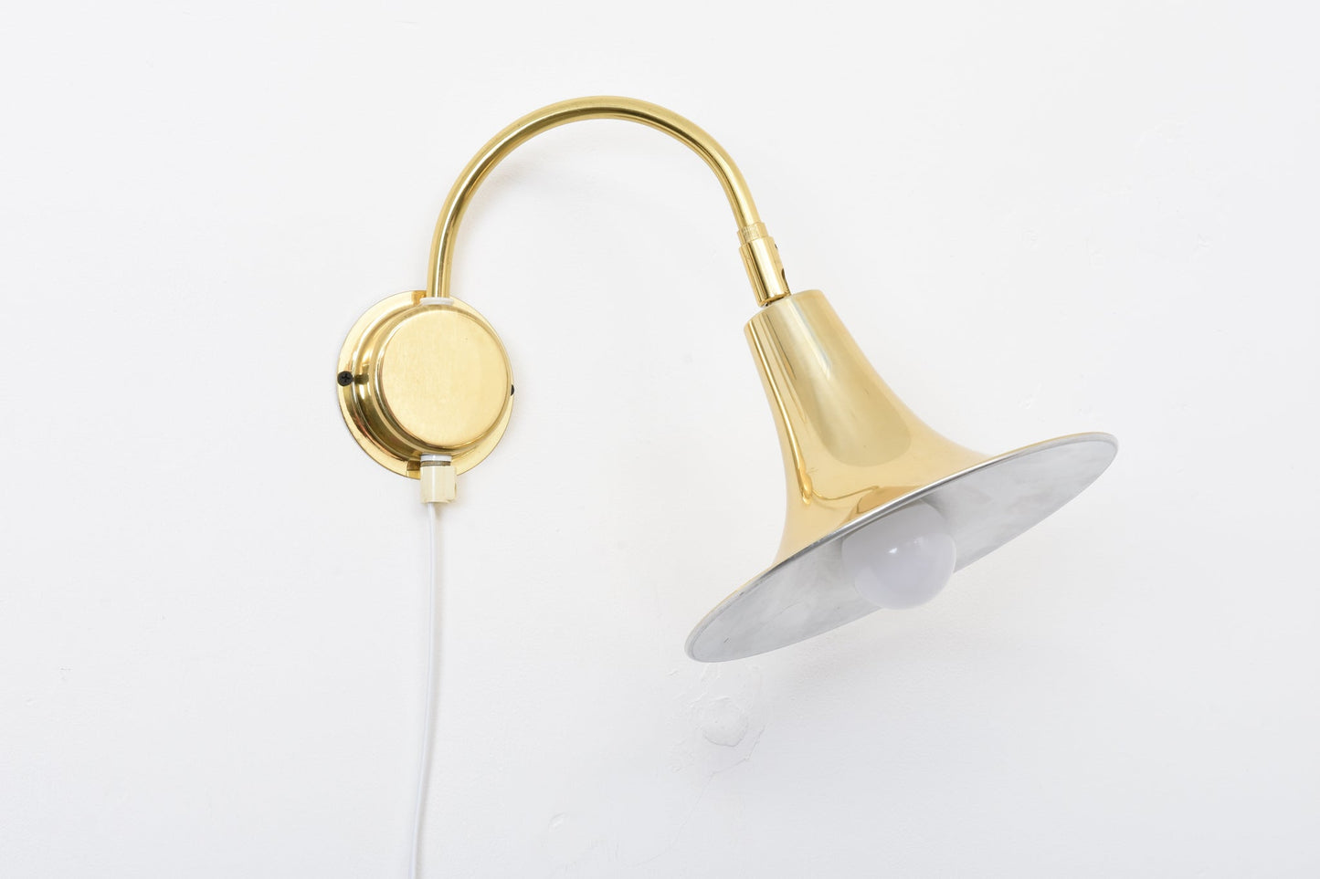 Save £45: 1970s brass wall light by Börje Claes