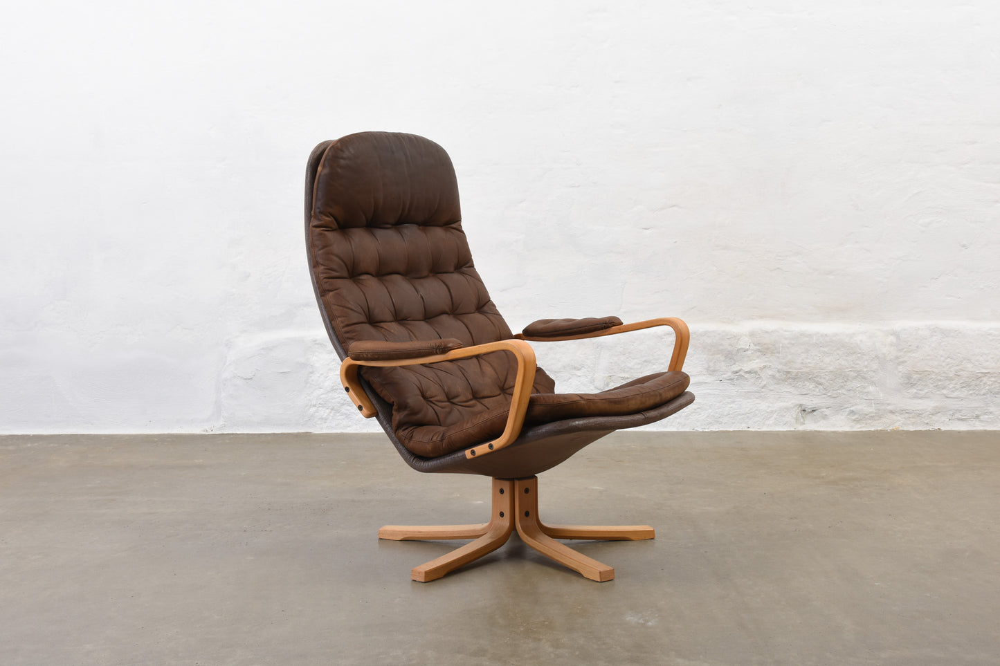 1960s leather swivel chair by Sam Larsson