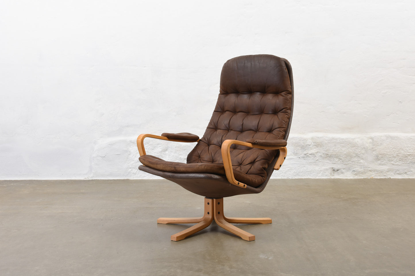 1960s leather swivel chair by Sam Larsson