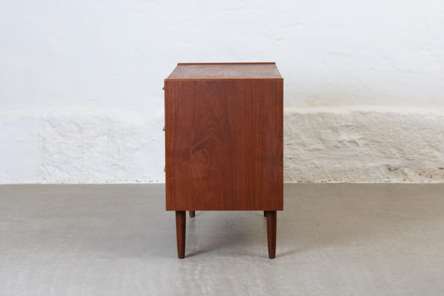 1960s low teak chest with lipped handles