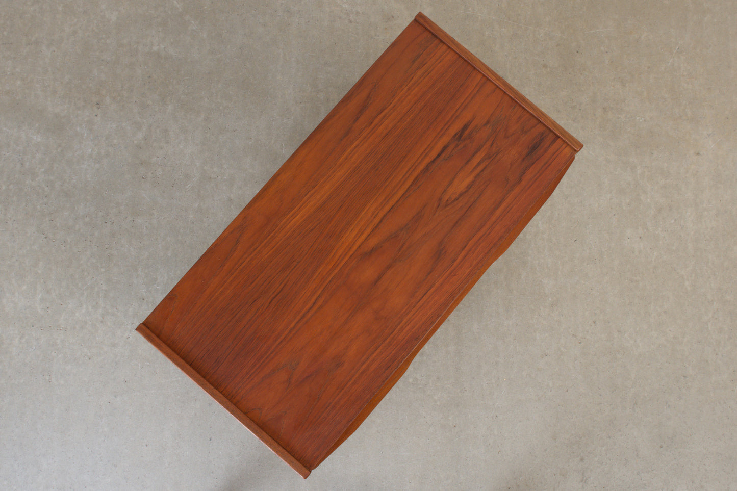 1960s low teak chest with lipped handles