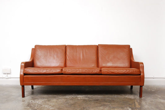 Three seat cognac leather sofa