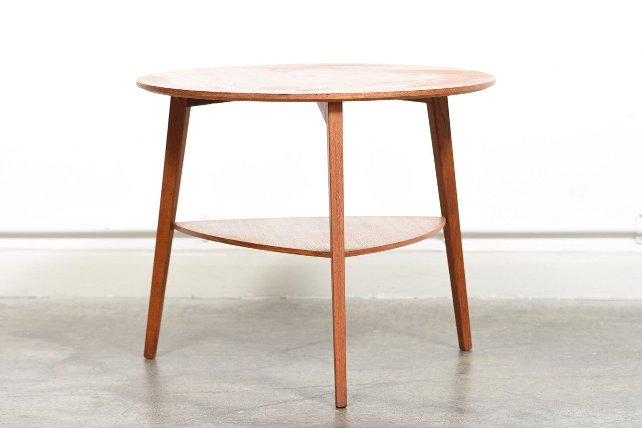 Round side table in teak