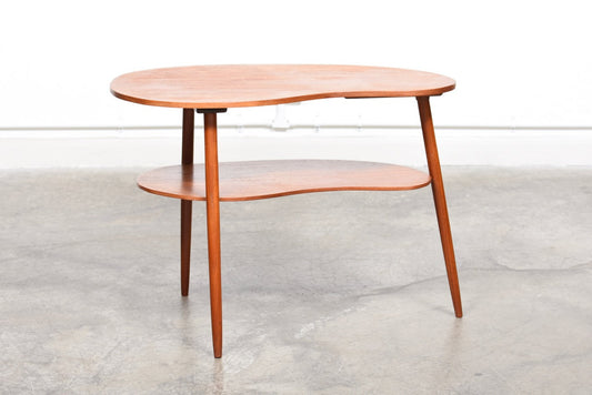 Organic side table in teak