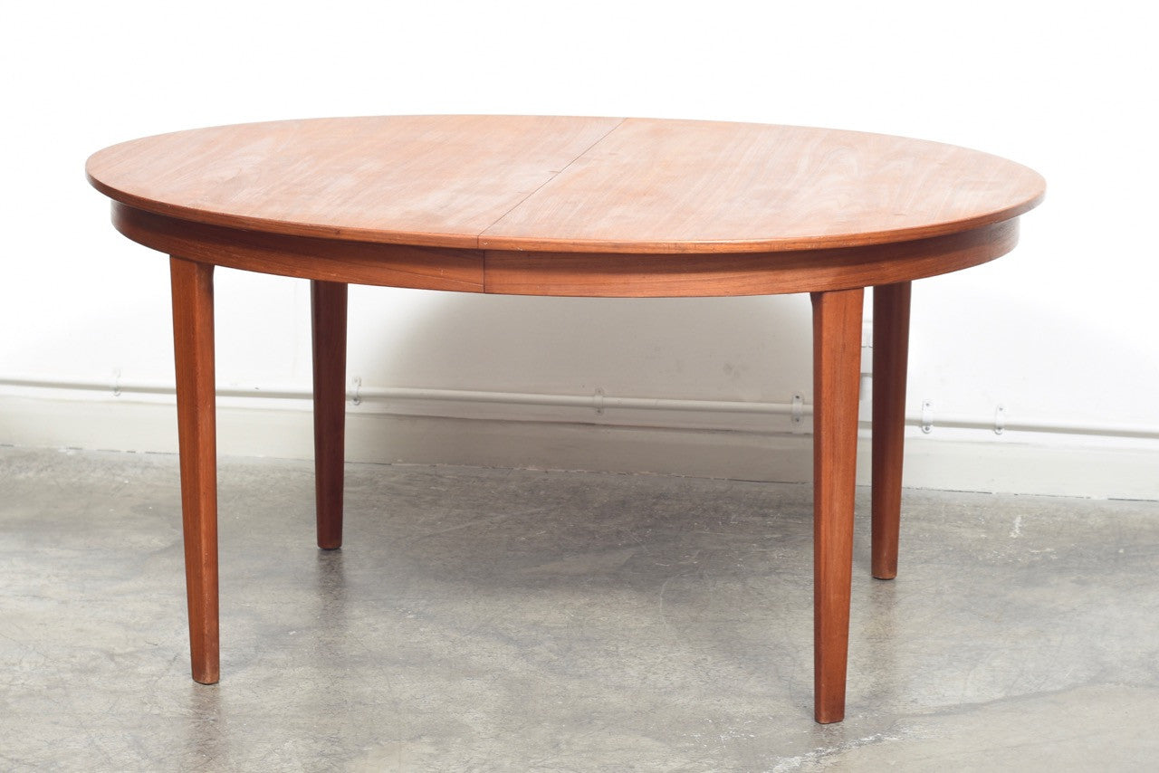 Extending oval dining table by Gunni Omann