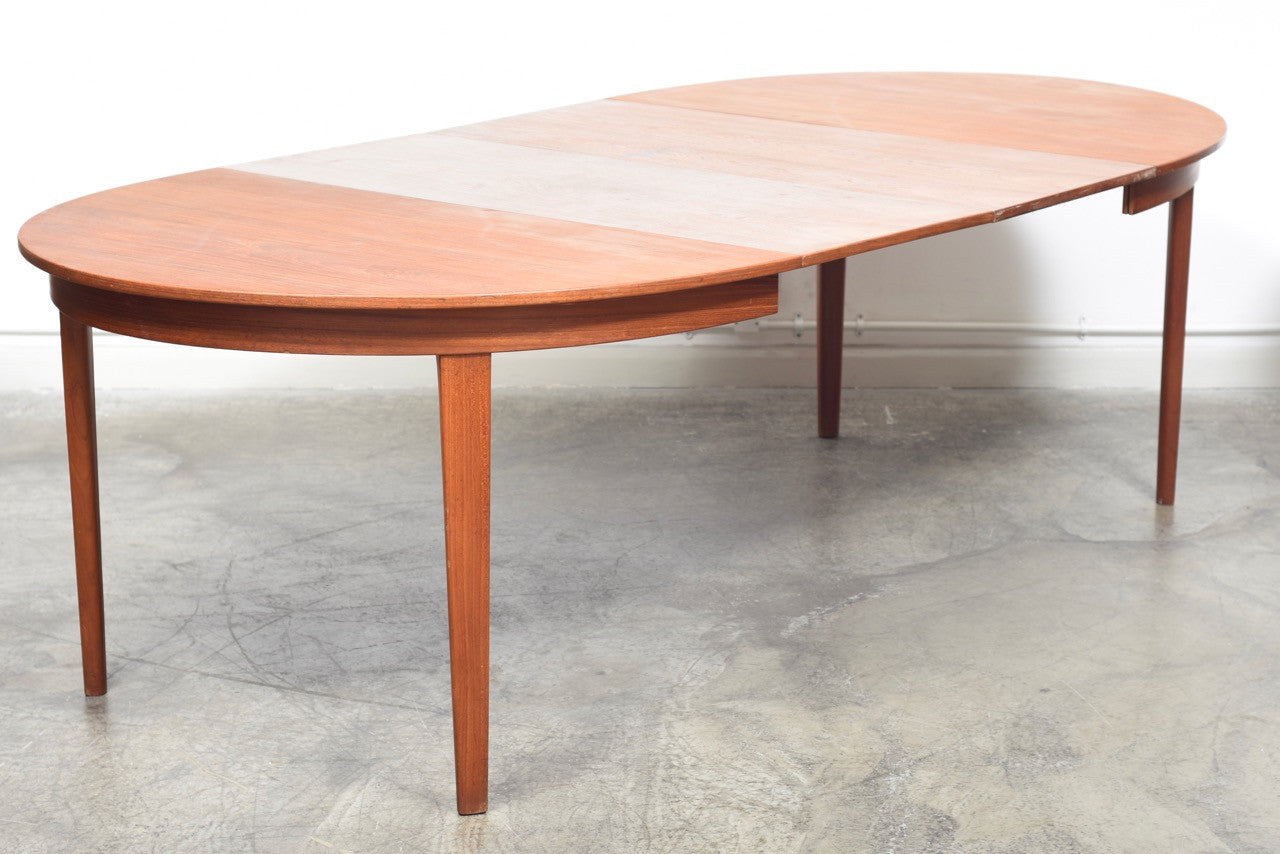 Extending oval dining table by Gunni Omann