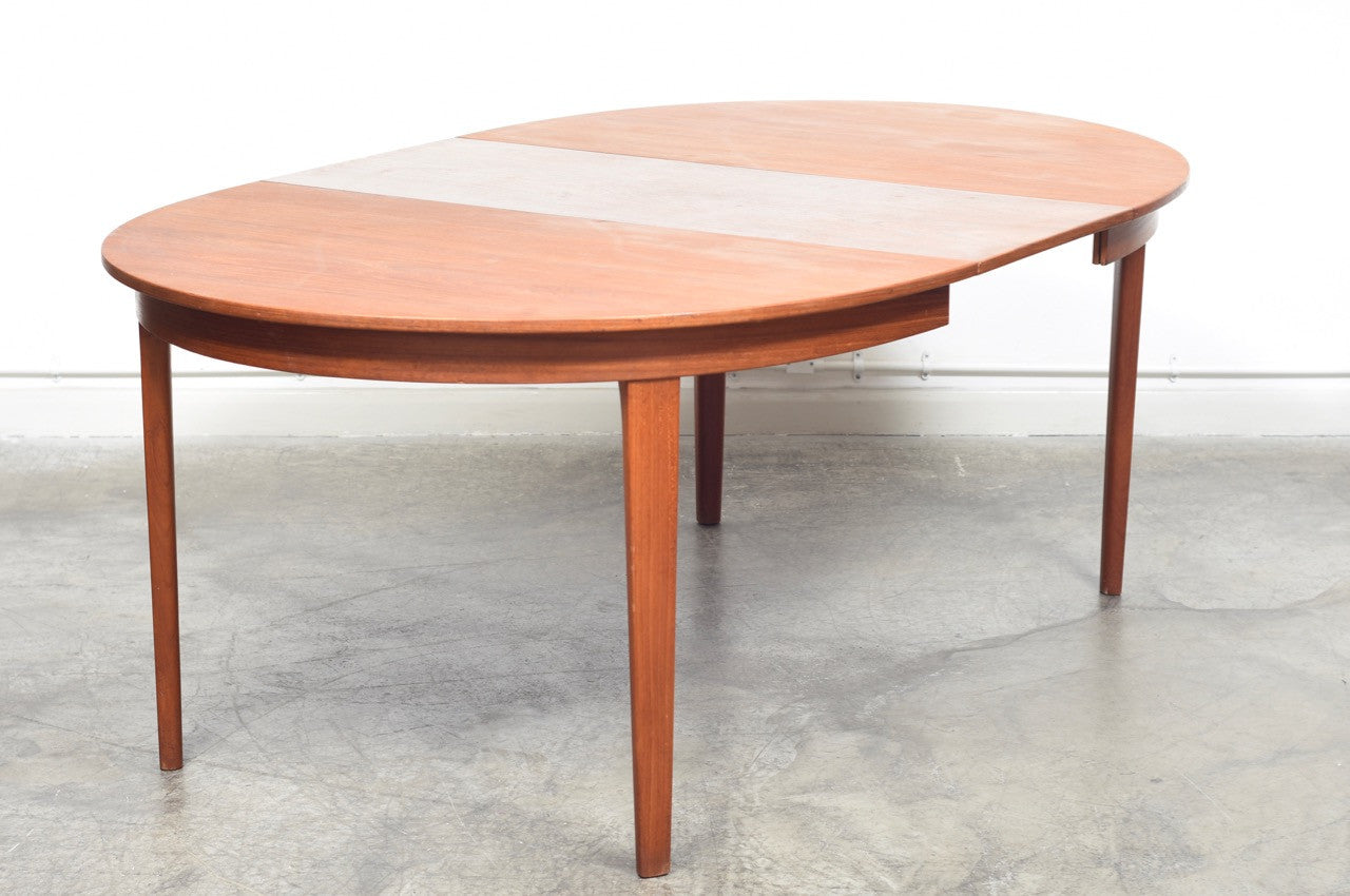 Extending oval dining table by Gunni Omann