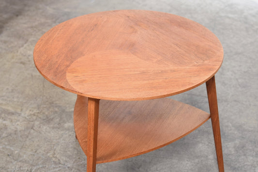 Round side table in teak