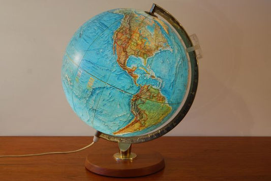 Globe on teak base with light