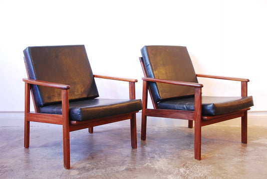 Pair of teak lounge chairs