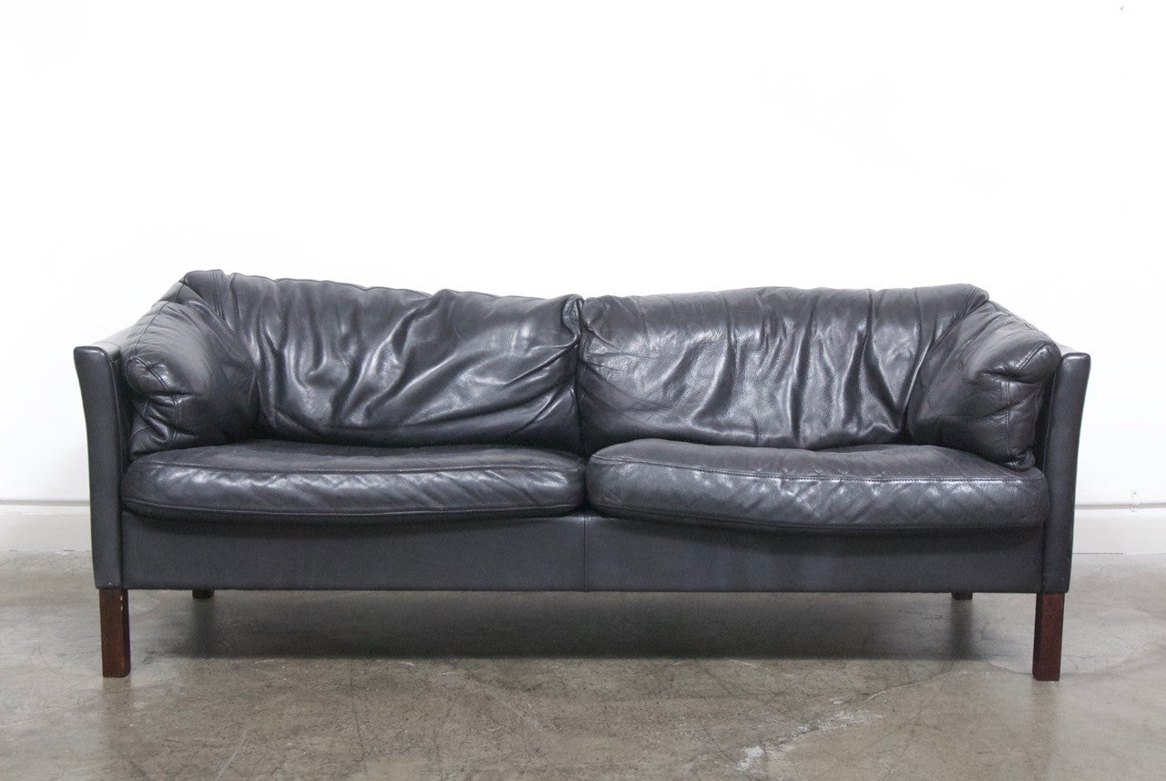 Two and a half seat leather sofa