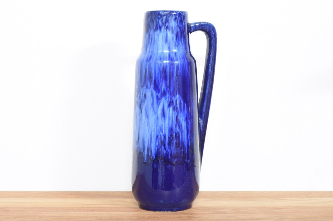 Tall blue pitcher vase