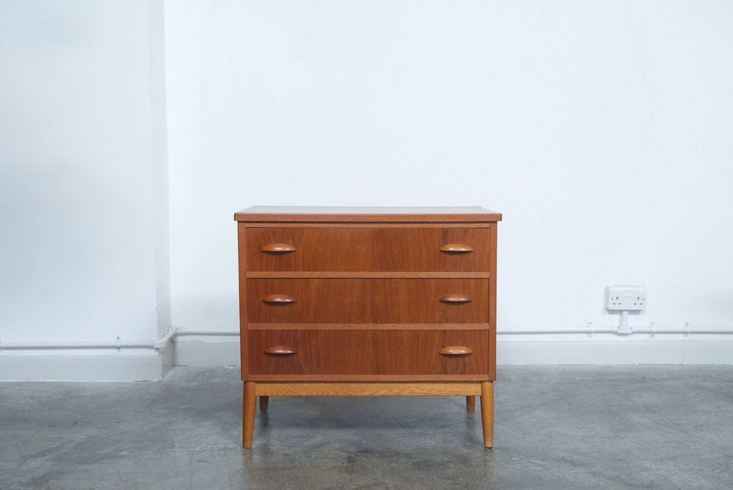 Teak chest of three drawers