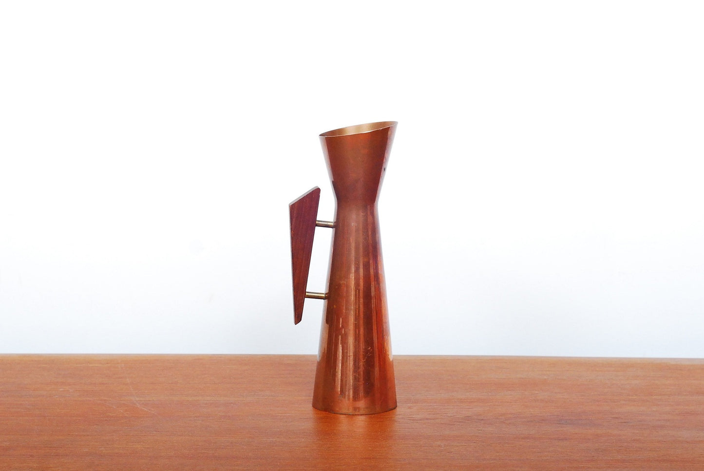 Copper vase with teak handle